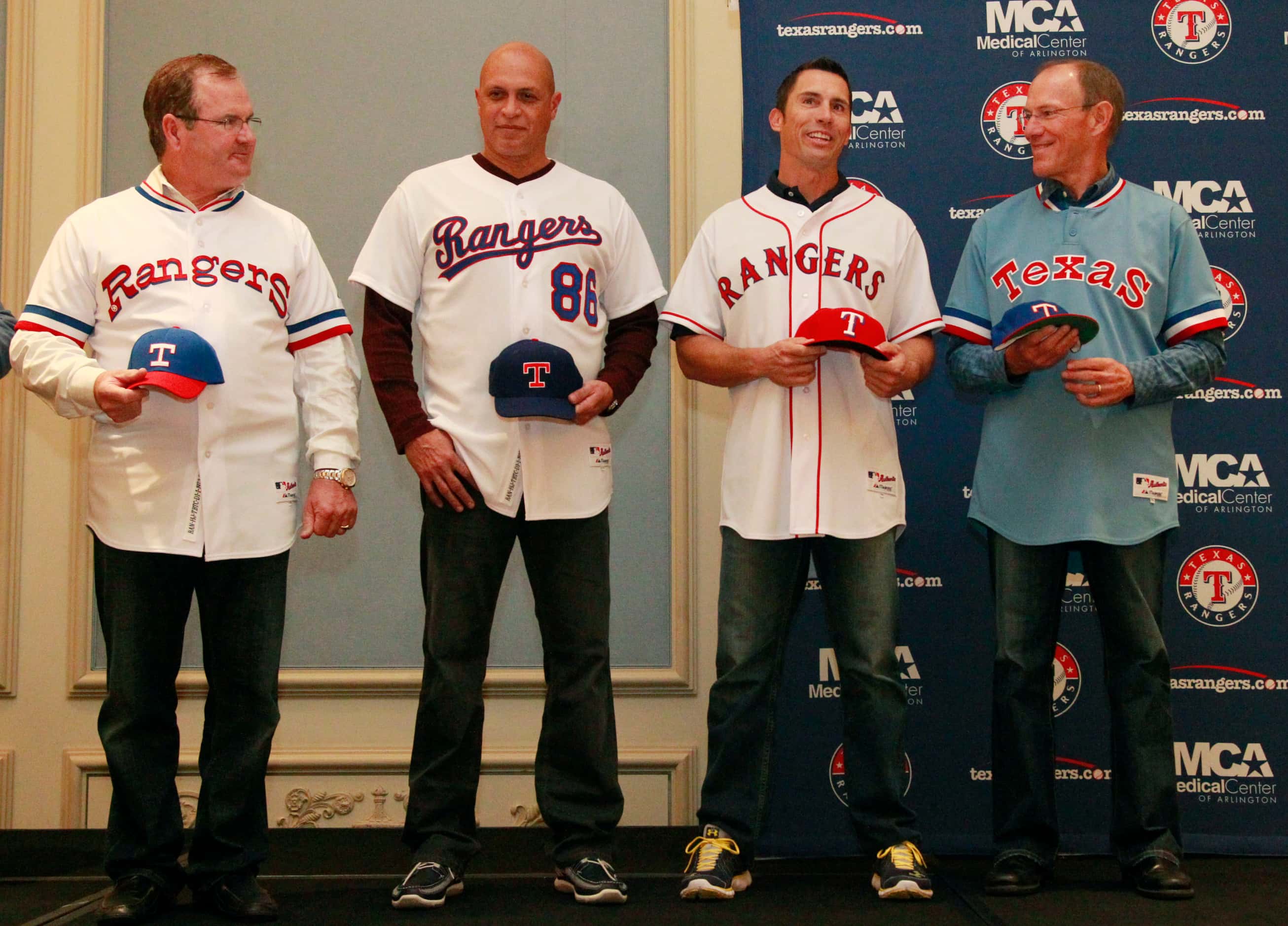 (Left to right) Jim Sundberg, Jose Guzman, David Hulse and Tom Grieve display Rangers "retro...