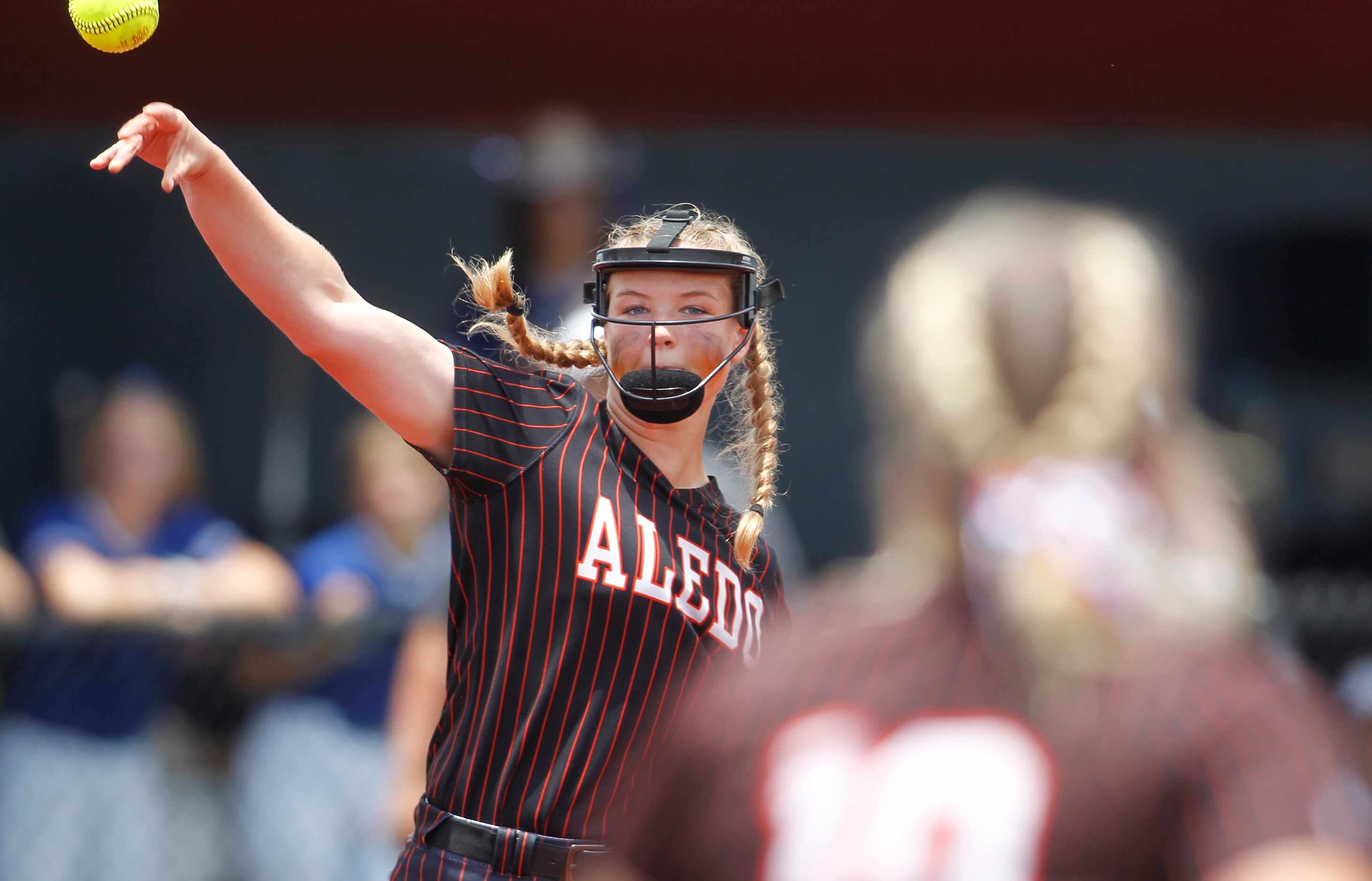 Aledo pitcher Kayleigh Smith (15) throws out a Georgetown batter after fielding a grounder...