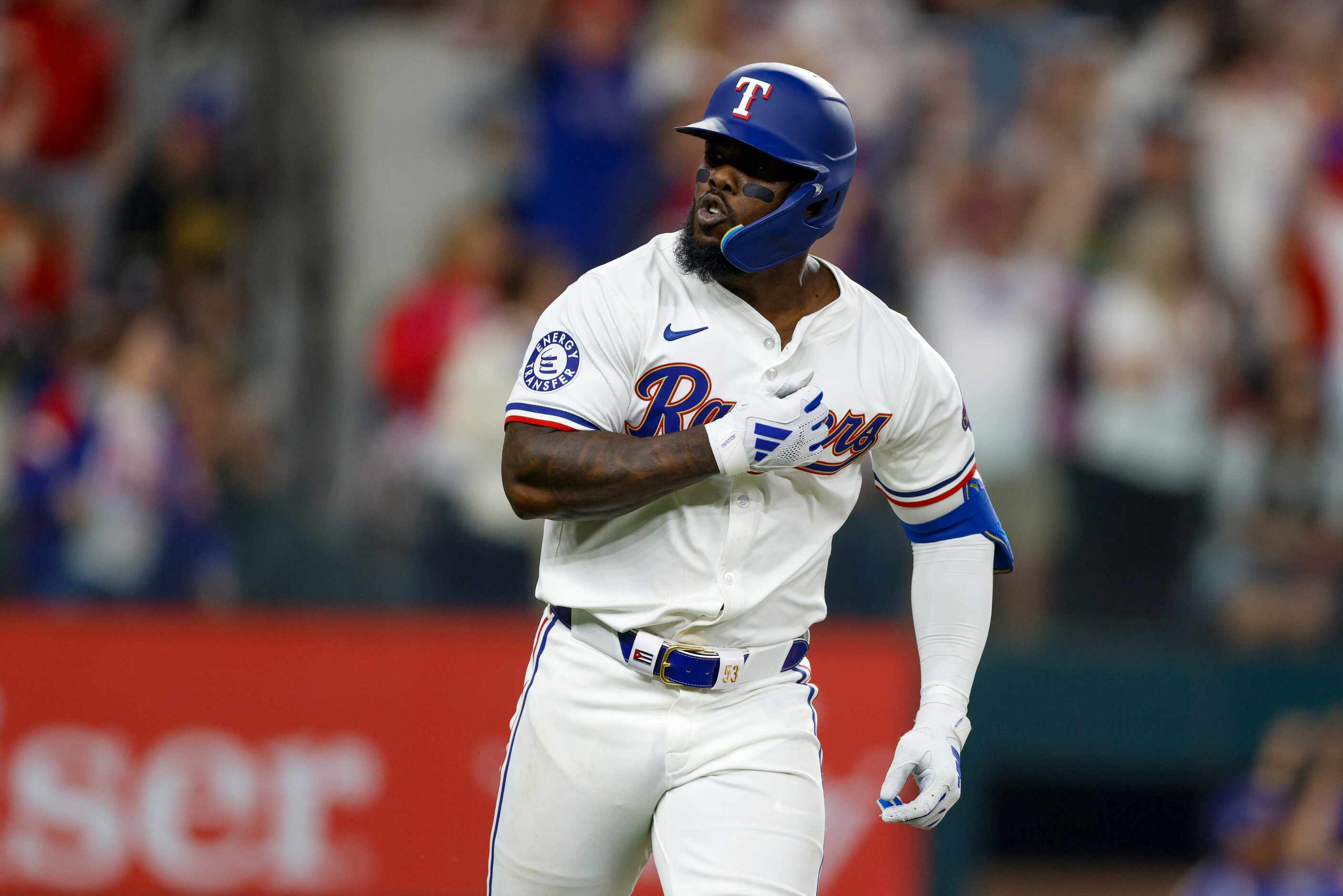 Texas Rangers right fielder Adolis Garcia (53) reacts after hitting a solo home run during...