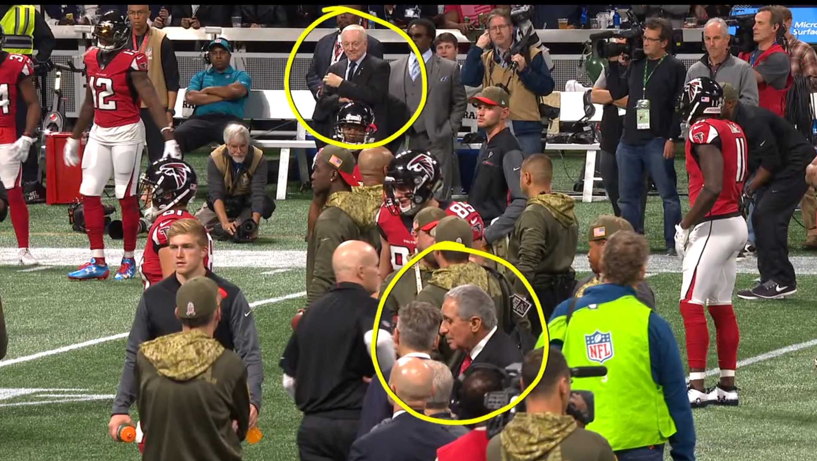 Atlanta Falcons owner Arthur Blank walks on the practice as the