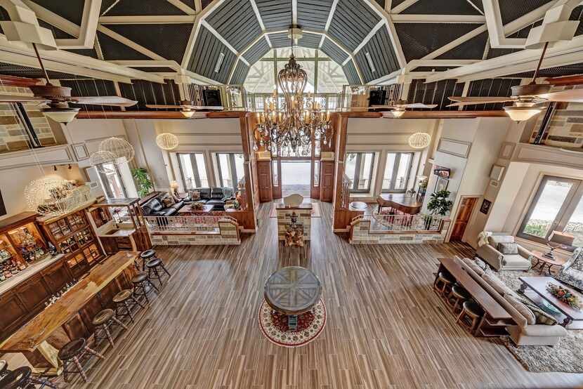 Take a look inside this 44,602-square-foot home at 9950 Palestine Road in Brenham. The home...