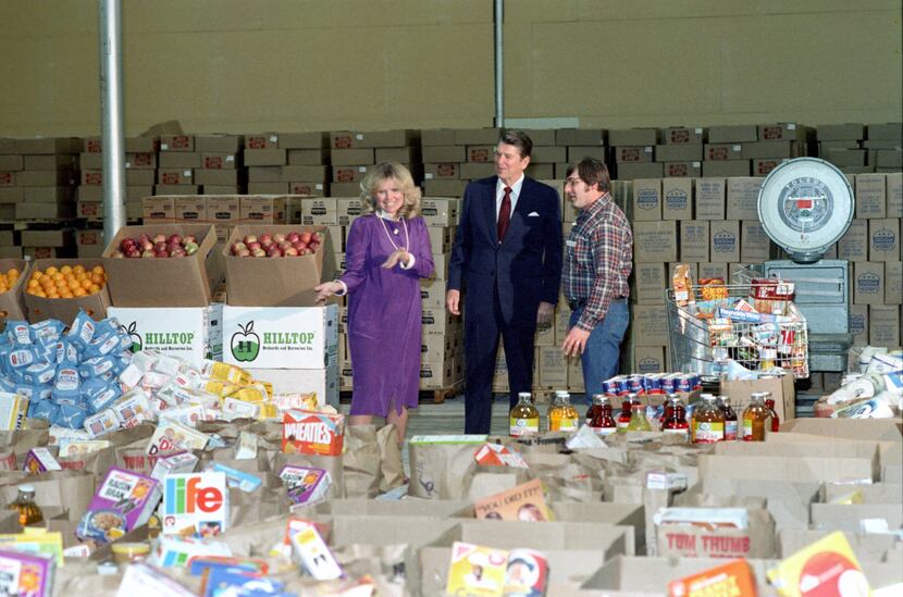 North Texas Food Bank co-founder Kathryn Hall and general manager Douglas Nelson showed...