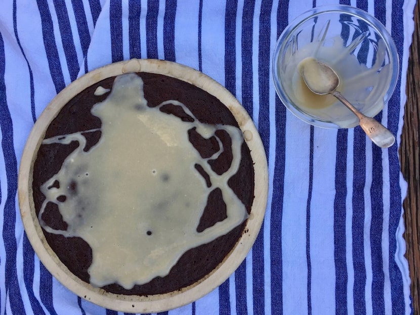 Easy, four-ingredient Flourless Chocolate Cake goes exotic with a Tahini Glaze.