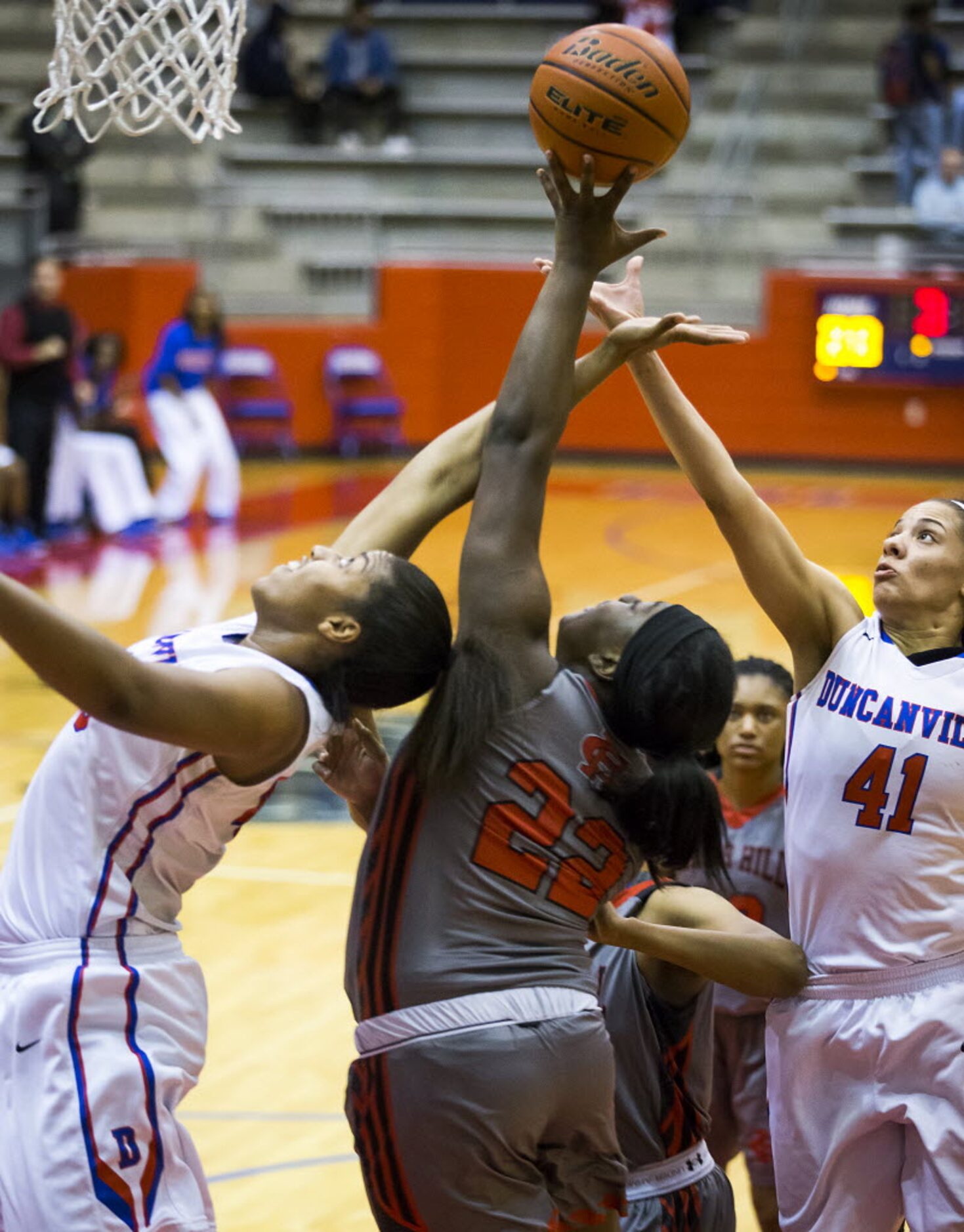 Duncanville forward Ciera Johnson (40) and forward Madison Townley (41) fight for a rebound...