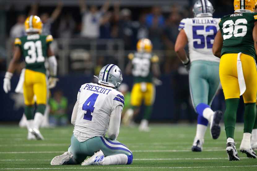 Dallas Cowboys quarterback Dak Prescott (4) looks as Dallas Cowboys wide receiver Amari...