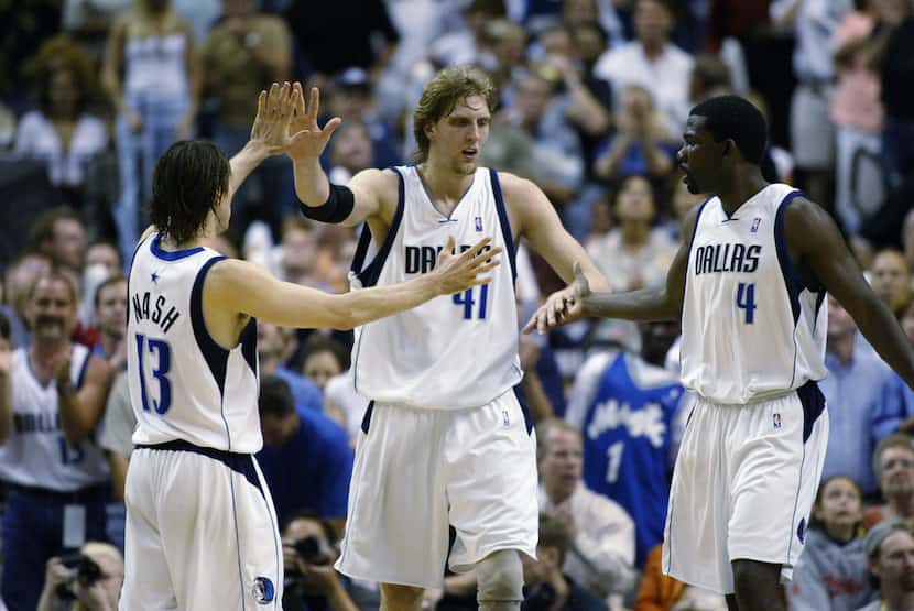 DALLAS - MAY 4:  (Left to Right) Steve Nash #13, Dirk Nowitzki #41, and Michael Finley #4 of...