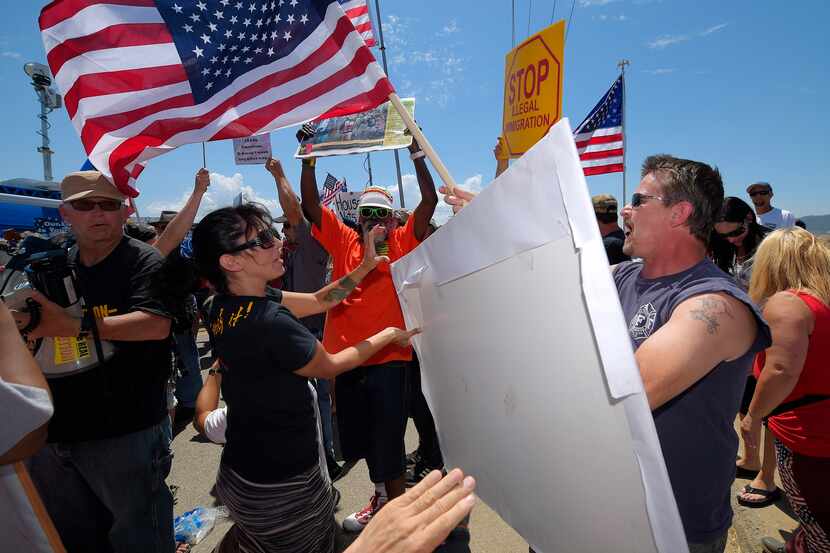 Demonstrators from opposing sides confronted each other Friday outside a U.S. Border Patrol...