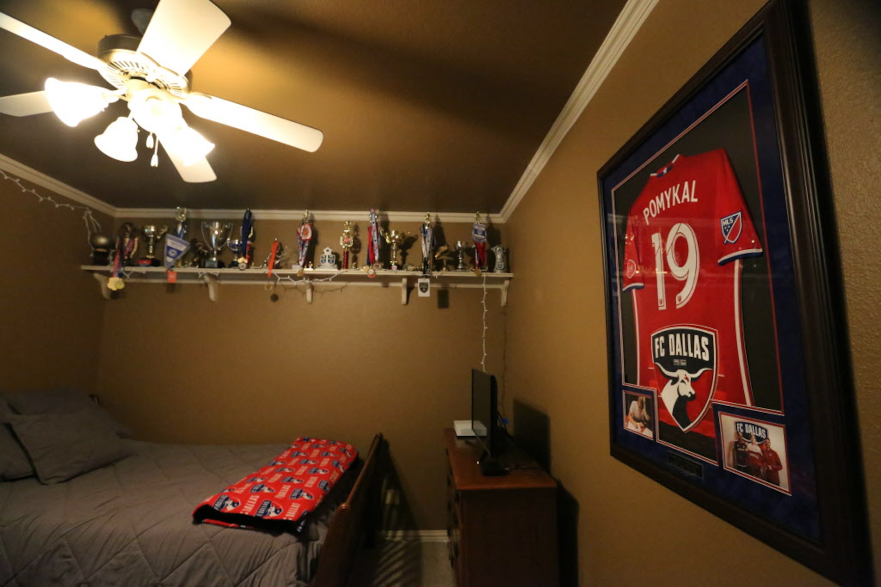 A look at the bedroom of Paxton Pomykal, a 17-year-old member of FC Dallas. Photographed at...