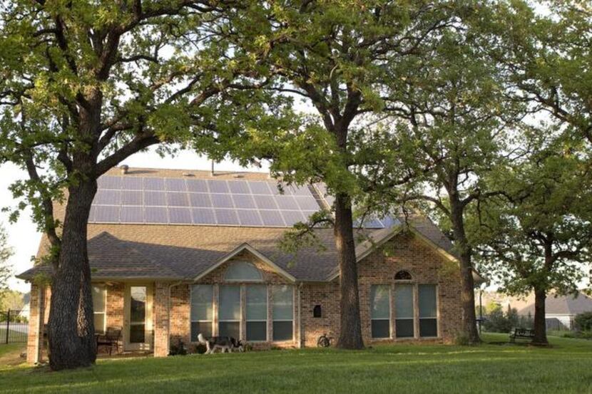 
The owners of this Flower Mound home were sued by their HOA for putting up solar panels...
