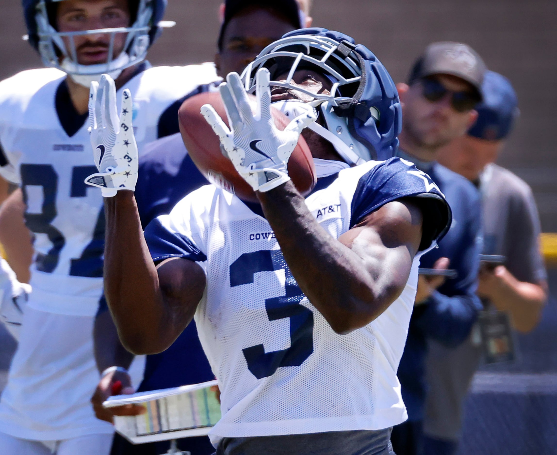 Dallas Cowboys wide receiver Brandin Cooks (3) pulls in a long pass in front of cornerback...