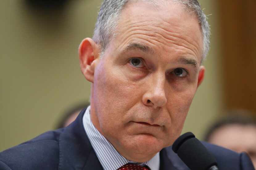 Environmental Protection Agency Administrator Scott Pruitt listens to questions as he...