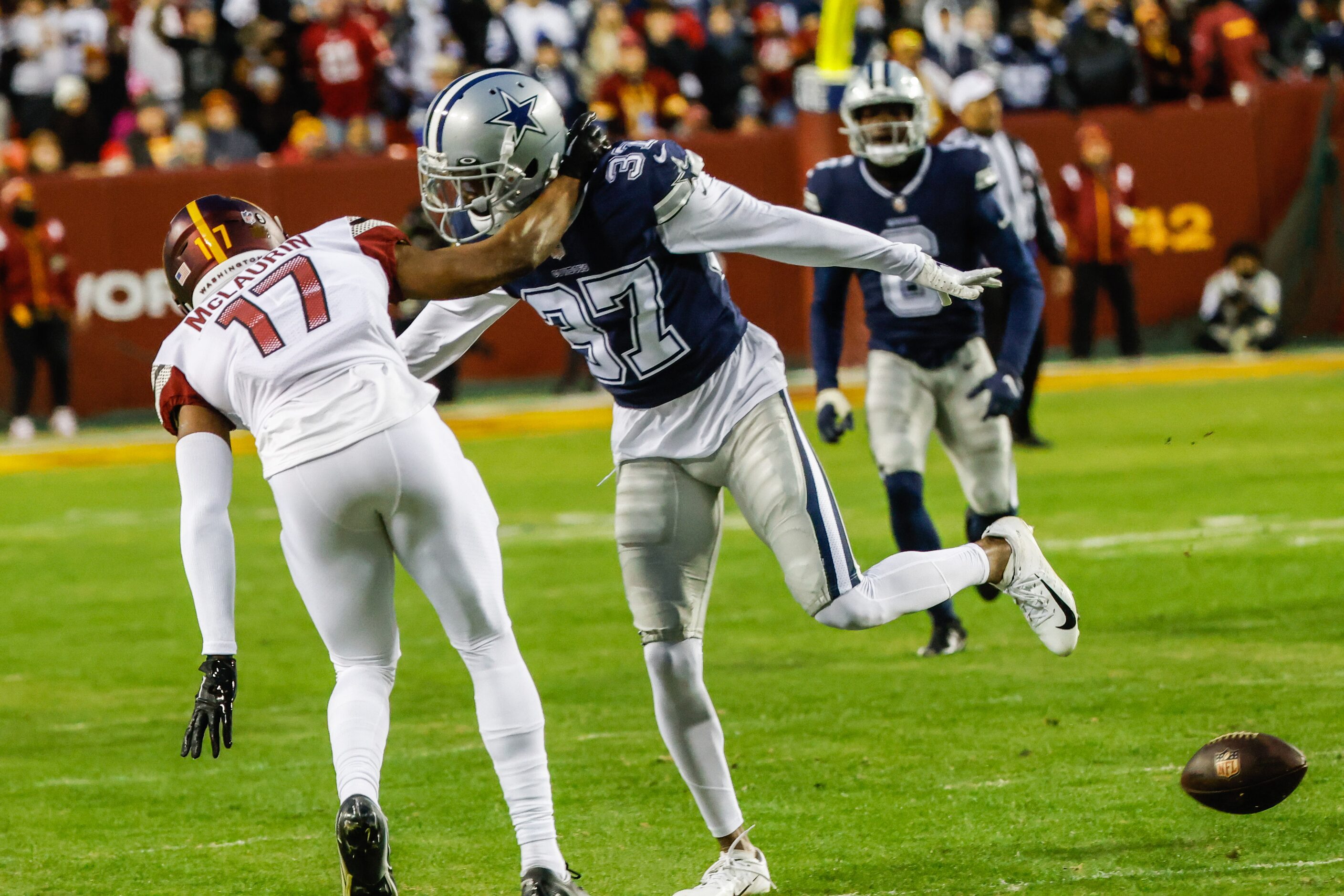 Dallas Cowboys cornerback Trayvon Mullen (37) and Washington Commanders wide receiver Terry...