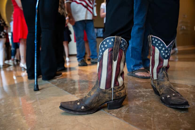 Karmen Siirtola donned patriotic boots for opening night of the conference at the Omni...