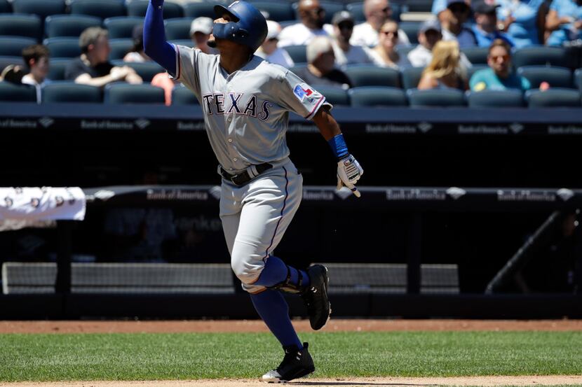 Texas Rangers' Carlos Gomez celebrates after hitting a two-run home run during the fourth...