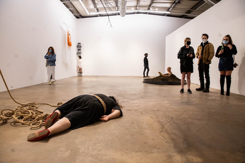 Viewers watch Dallas artist Christian Cruz's 'Piñata Dance' performed by Amy Zapien at Ex...