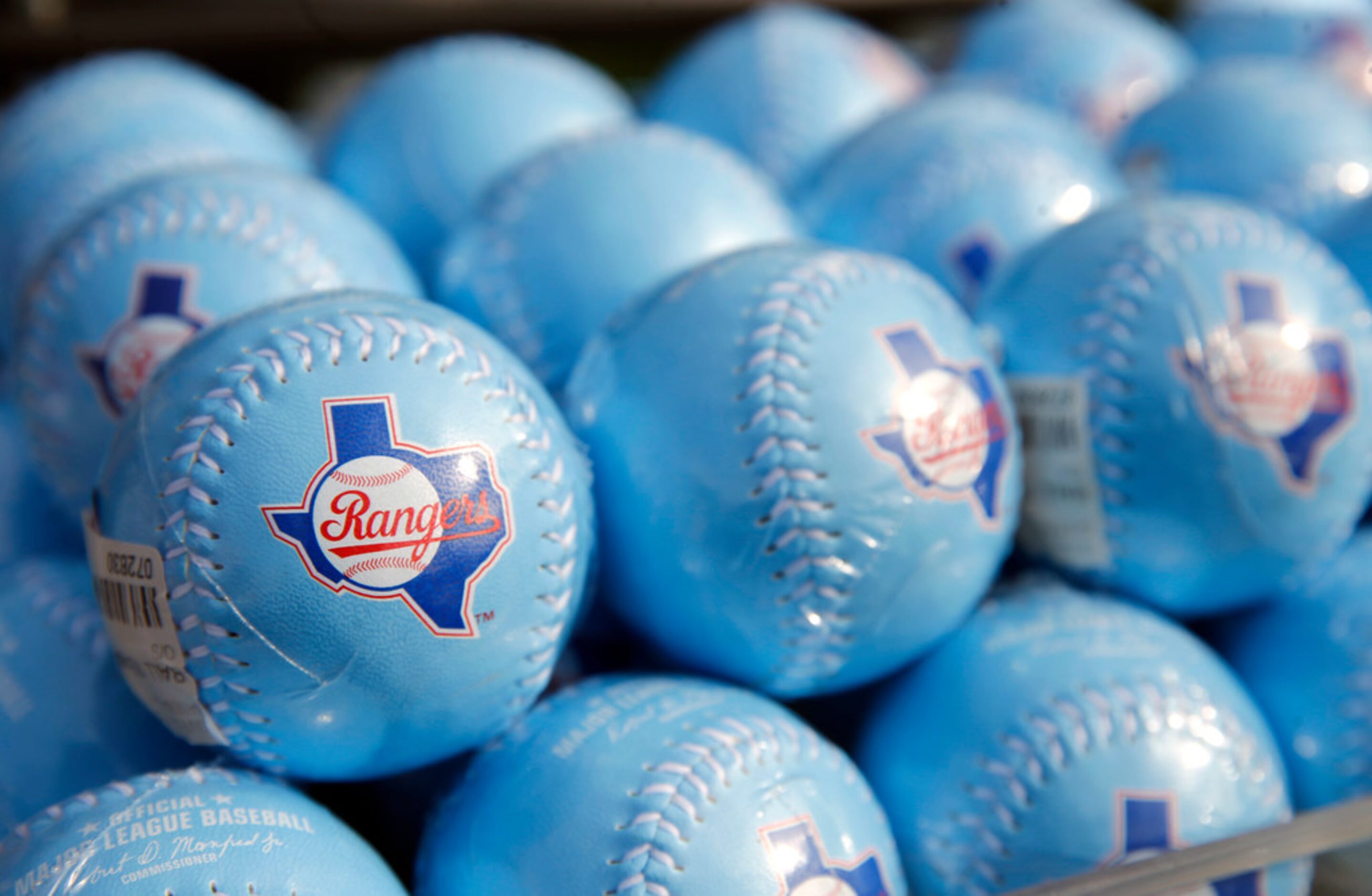 Powder blue Texas Rangers baseballs on display during the unveiling of the 2020 uniforms at...