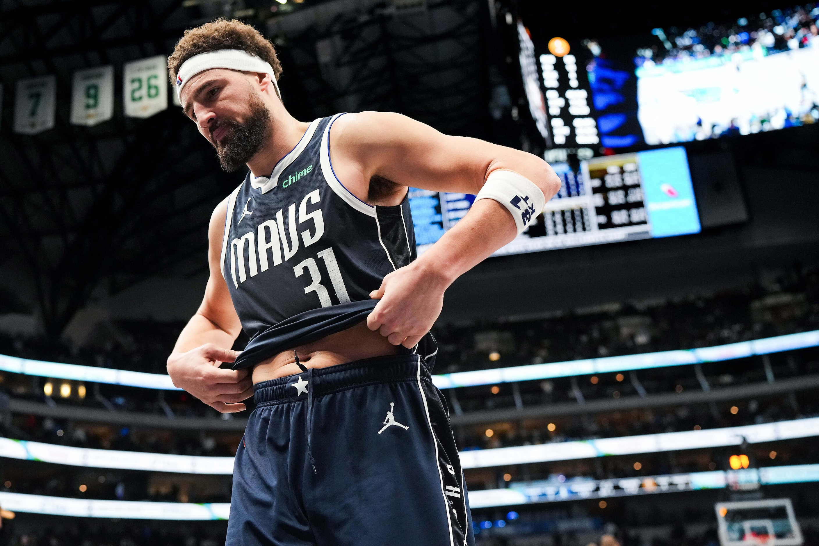 Dallas Mavericks guard Klay Thompson walks off the court after a loss to the Denver Nuggets...