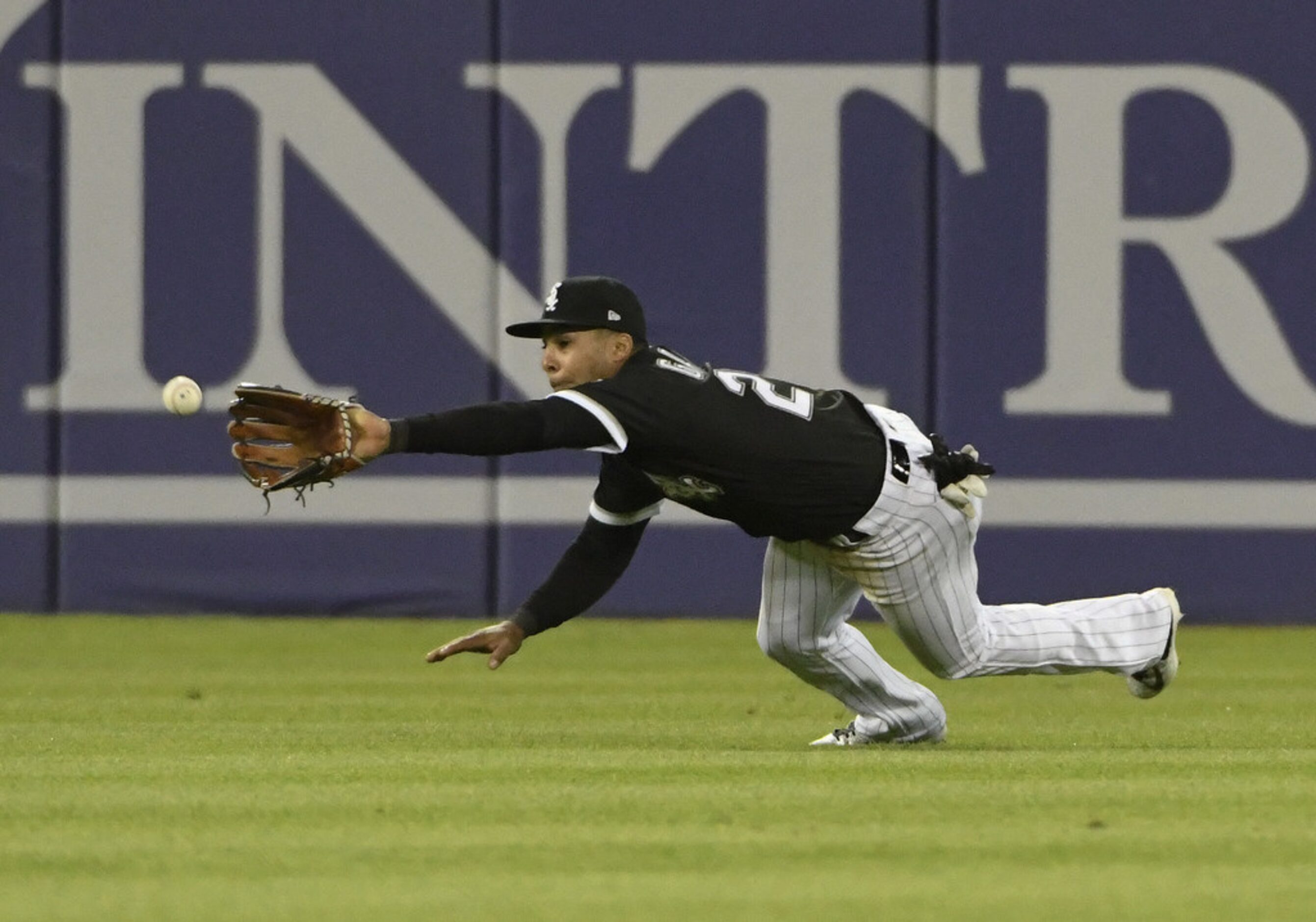 CHICAGO, IL - MAY 17: Leury Garcia #28 of the Chicago White Sox makes a catch on Joey Gallo...