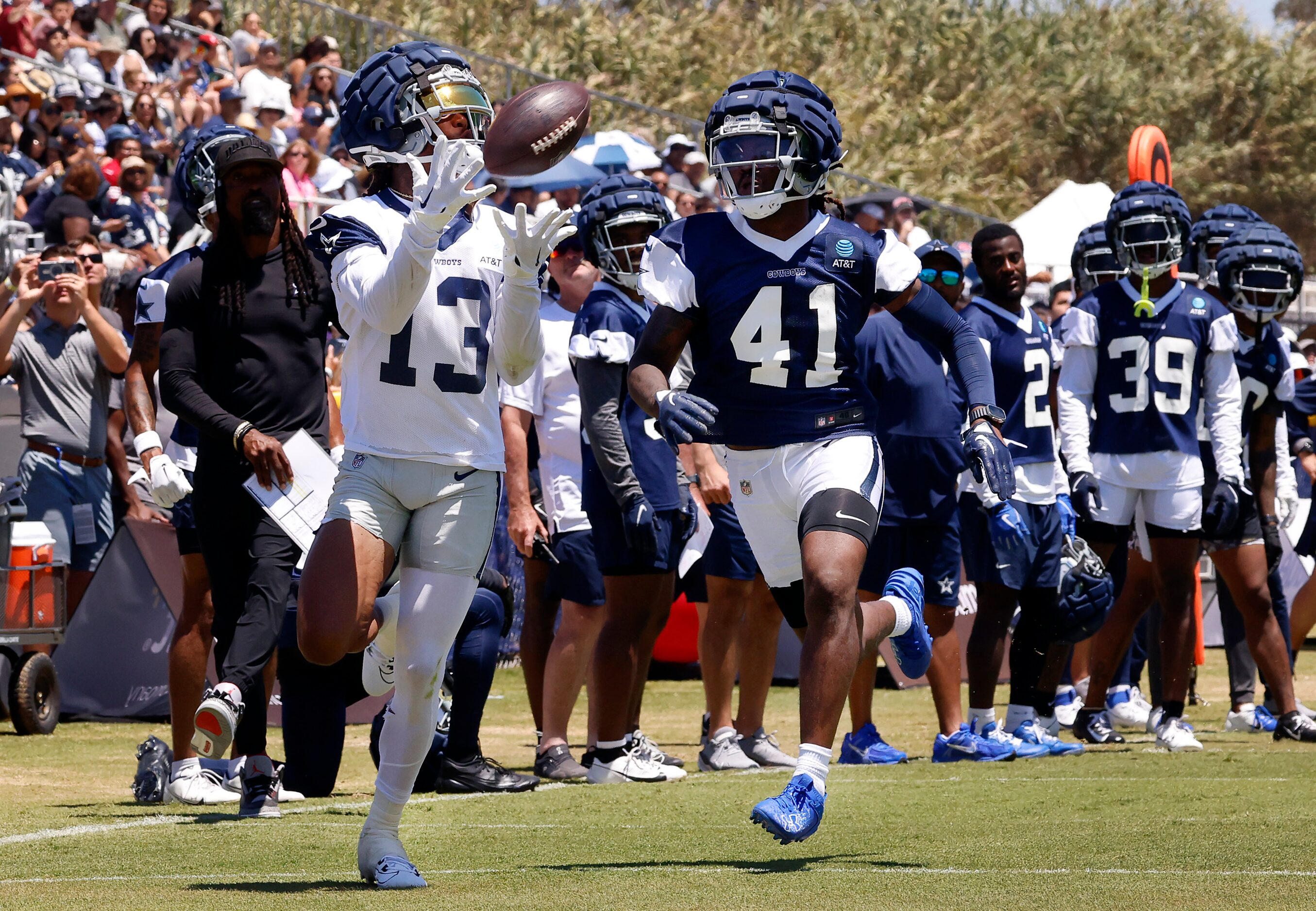 Dallas Cowboys wide receiver Tyron Billy-Johnson (13) hauls in a long pass for a touchdown...