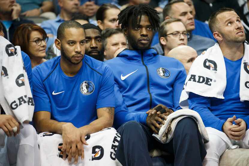 Dallas Mavericks guard Devin Harris (left), center Nerlens Noel (center) and guard J.J....