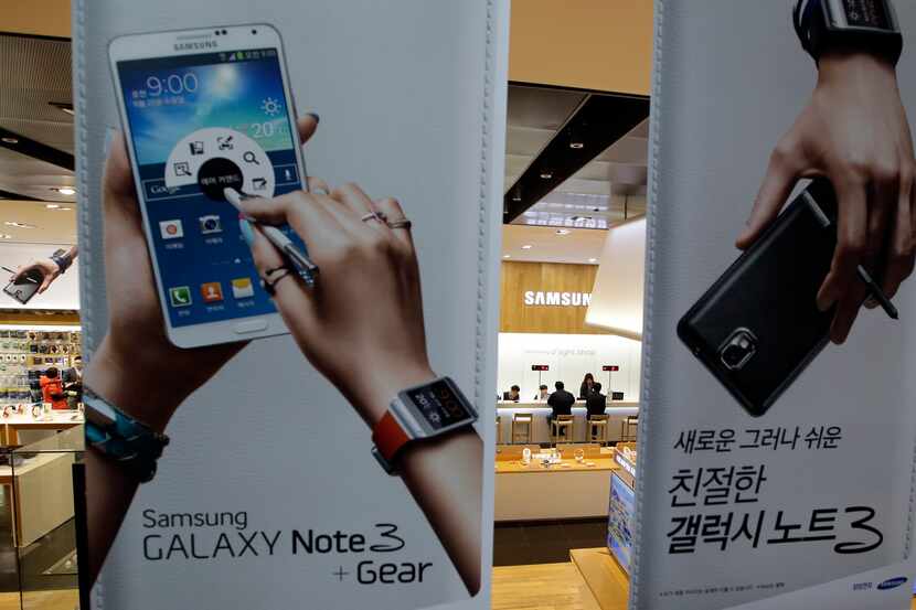 In this photo taken on Jan. 7, 2014, billboard for Samsung Electronics' Galaxy Note 3 hang...