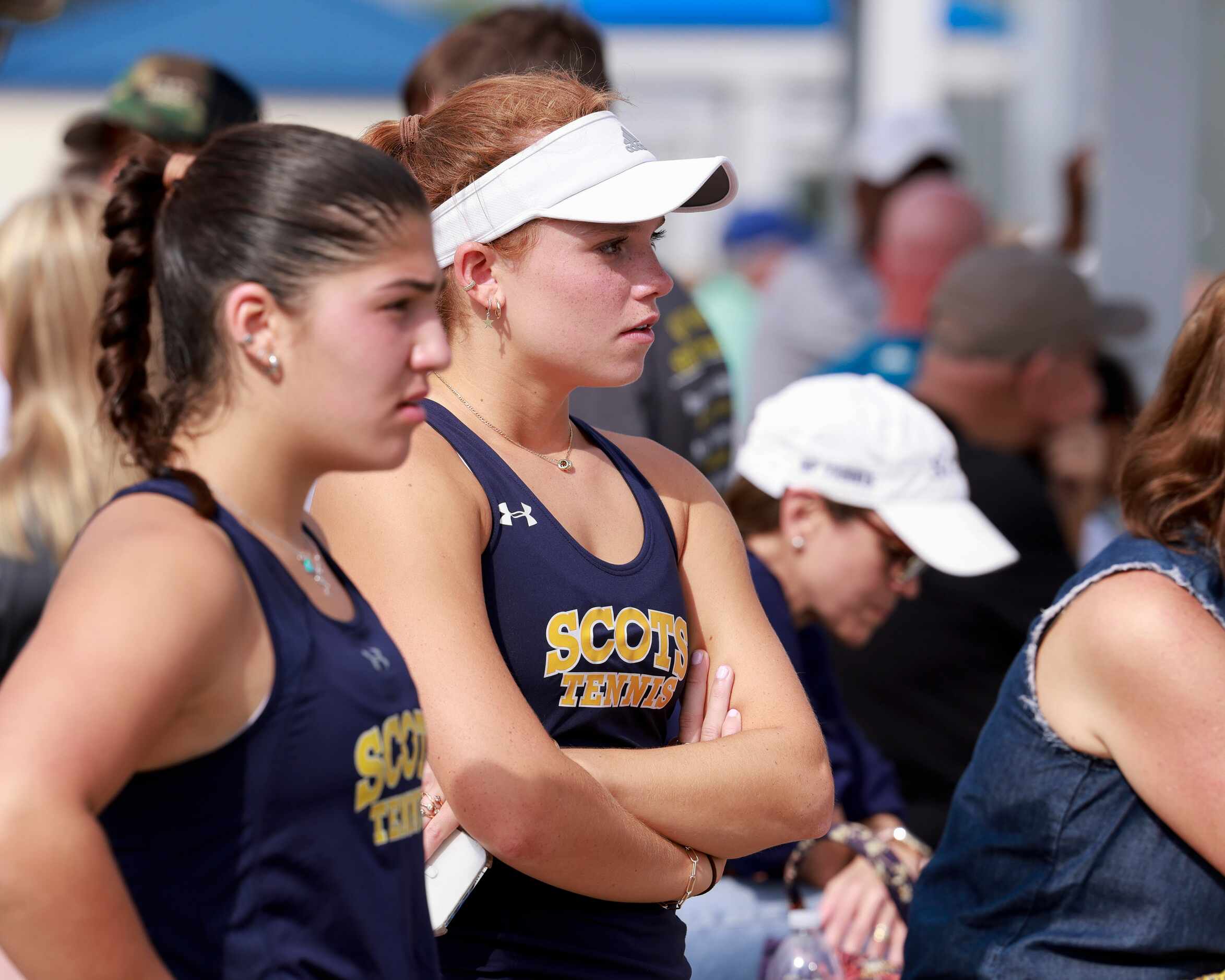 Highland Park’s Isabella McElfresh (right) and Eden Rogozinski watch the 5A boys doubles...