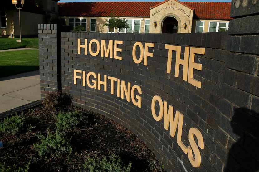 An exterior view of Garland High School, home of the Fighting Owls, in Garland, Texas,...