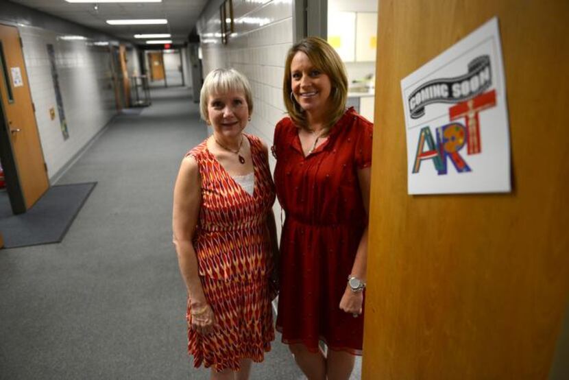 
Shugart Elementary School principal Kelly Williams (right) and Garland ISD fine arts...