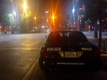An Austin police car parked just off Sixth Street on Tuesday. 