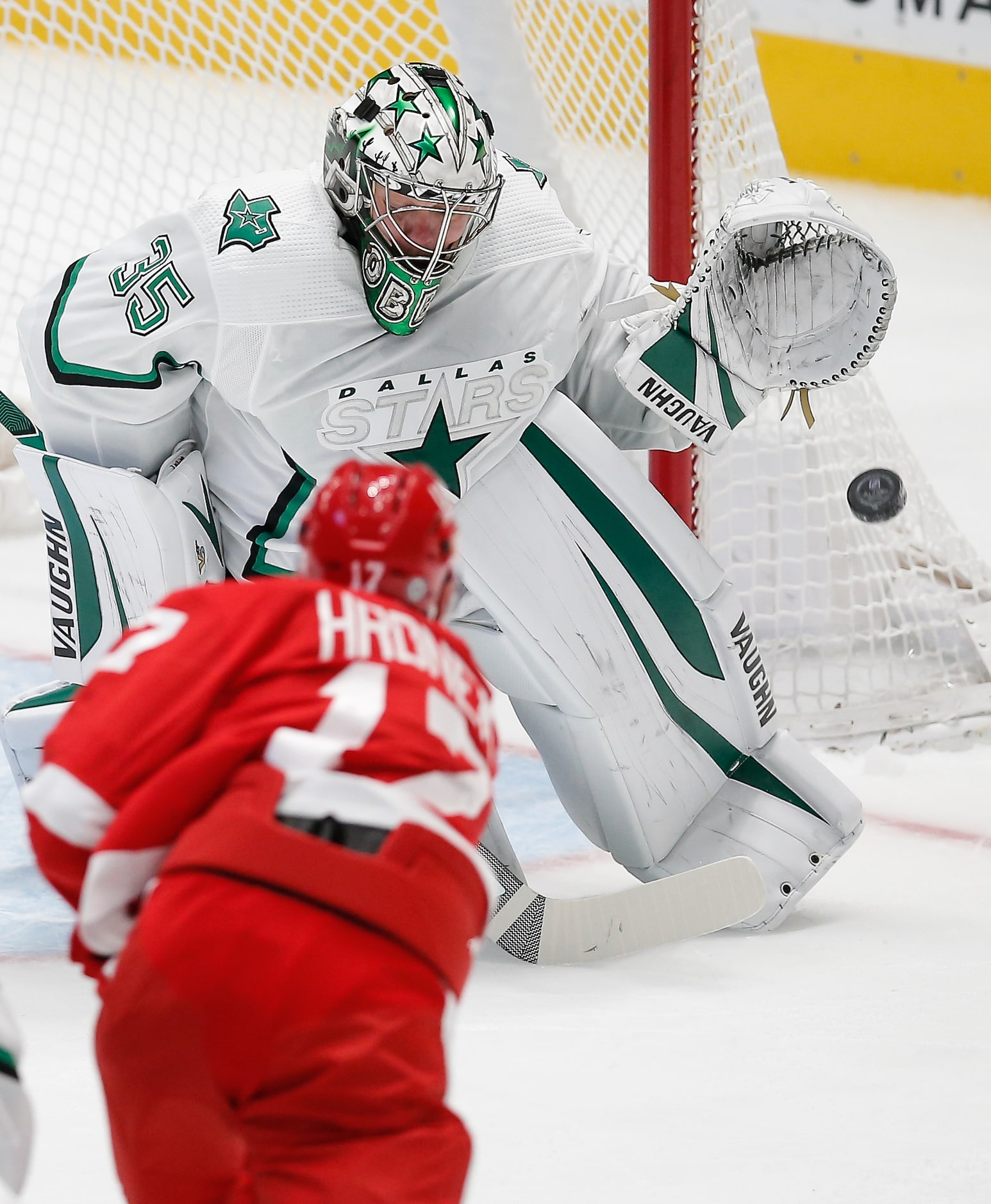 Detroit Red Wings defenseman Filip Hronek (17) shoots the puck wide as Dallas Stars...