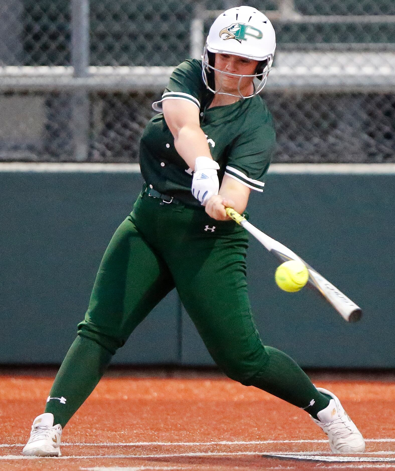 Prosper High School first baseman Sydney Lewis makes contact in the second inning as Prosper...