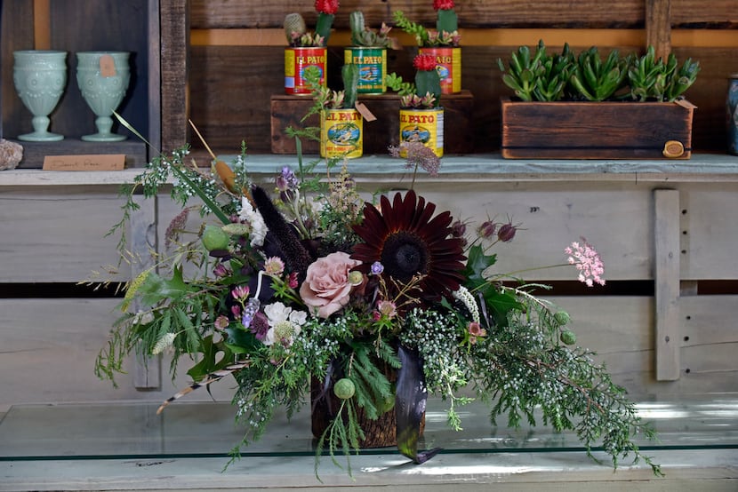 A custom floral arrangement designed by co-owner and lead designer Sonya Eudaley of Dirt...