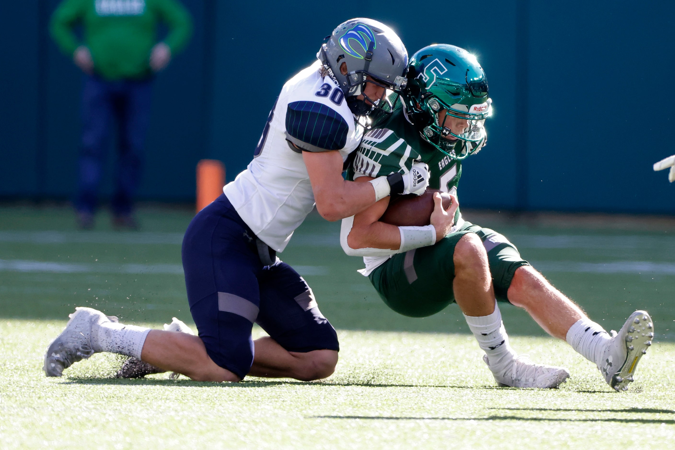 Eaton’s Andrew Perkins (30) tackles Prosper quarterback Jackson Berry (5) during the Class...