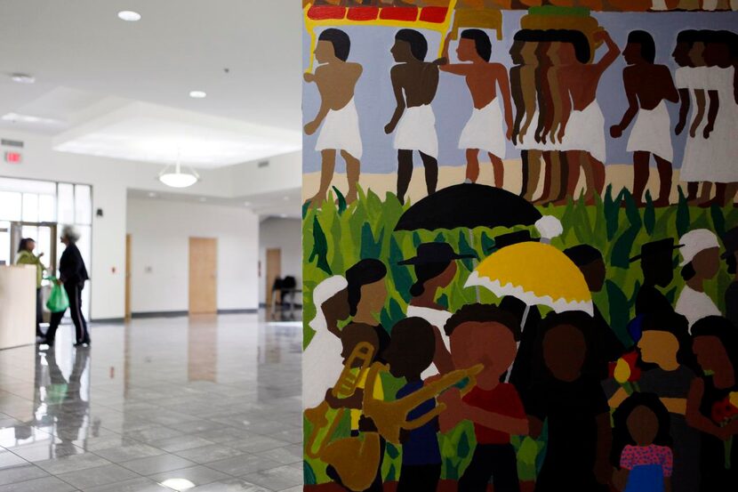 
One of three murals titled “African Funerary Practices and their American Translations,” on...