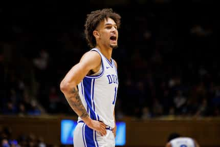 Duke's Dereck Lively II (1) shouts to his bench during an NCAA college basketball game in...