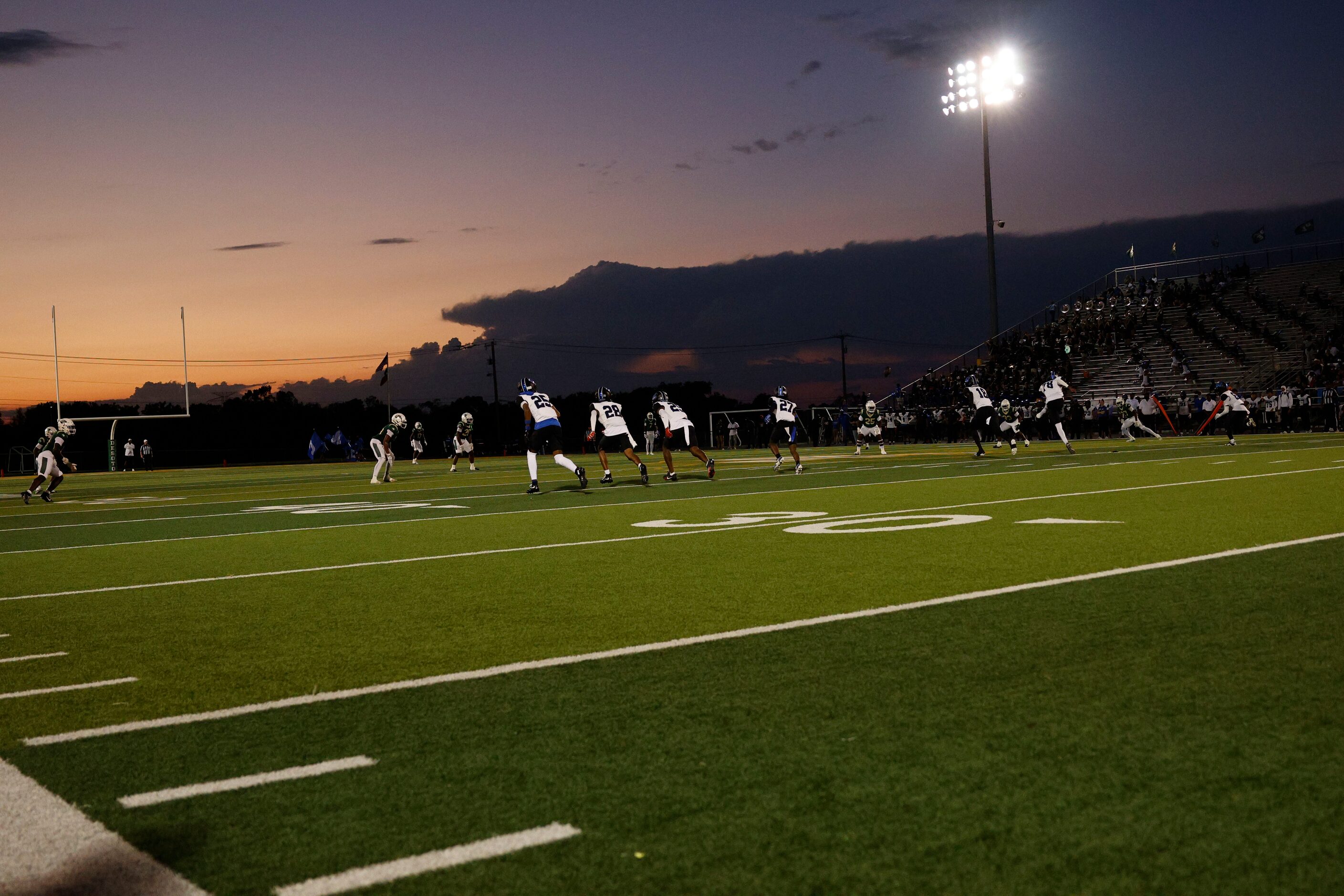 DeSoto players and North Crowley players are seen during the first half of a high school...