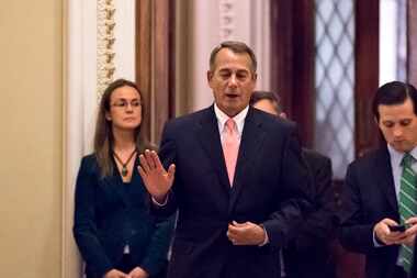 Speaker of the House John Boehner, R-Ohio, returns to his office after a vote on the...