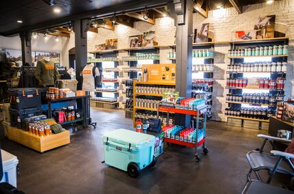 Coolers, cups, apparel and other products are on display inside a new Yeti store on Knox St....