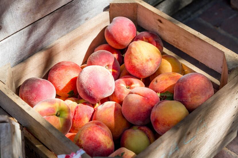 Crate of fresh peaches
