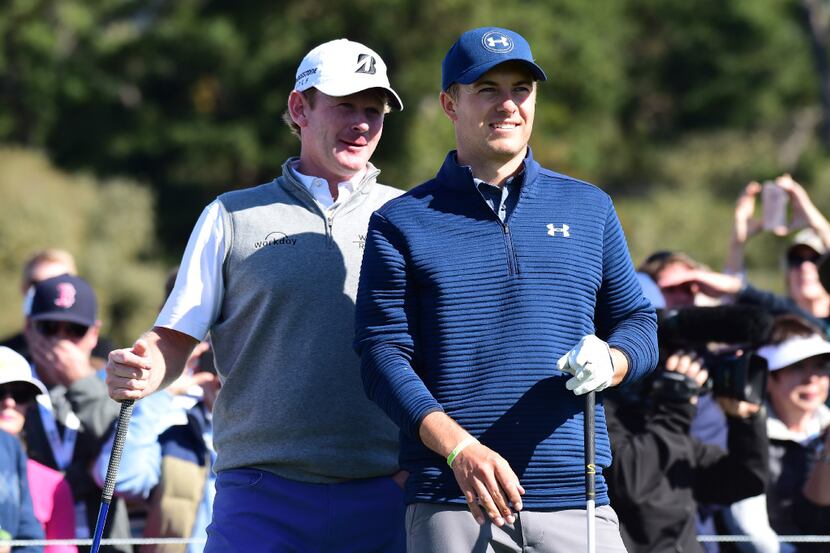 PEBBLE BEACH, CA - FEBRUARY 12:  Jordan Spieth and Brandt Snedeker stand on the sixth hole...