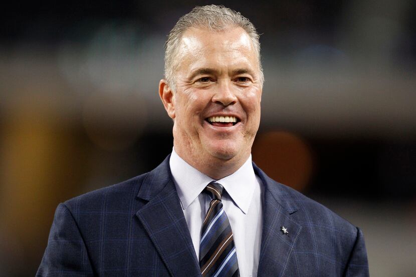 Dallas Cowboys executive vice president Stephen Jones smiles as he walks the field before a...