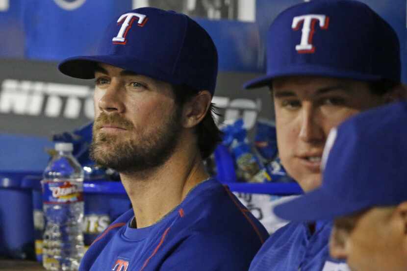 Texas Rangers starting pitchers Cole Hamels (left) and  Derek Holland (right) are pictured...
