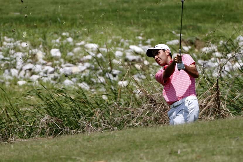 Anthony Paolucci watches his ball on the fourteenth hole in the first round of the Greater...