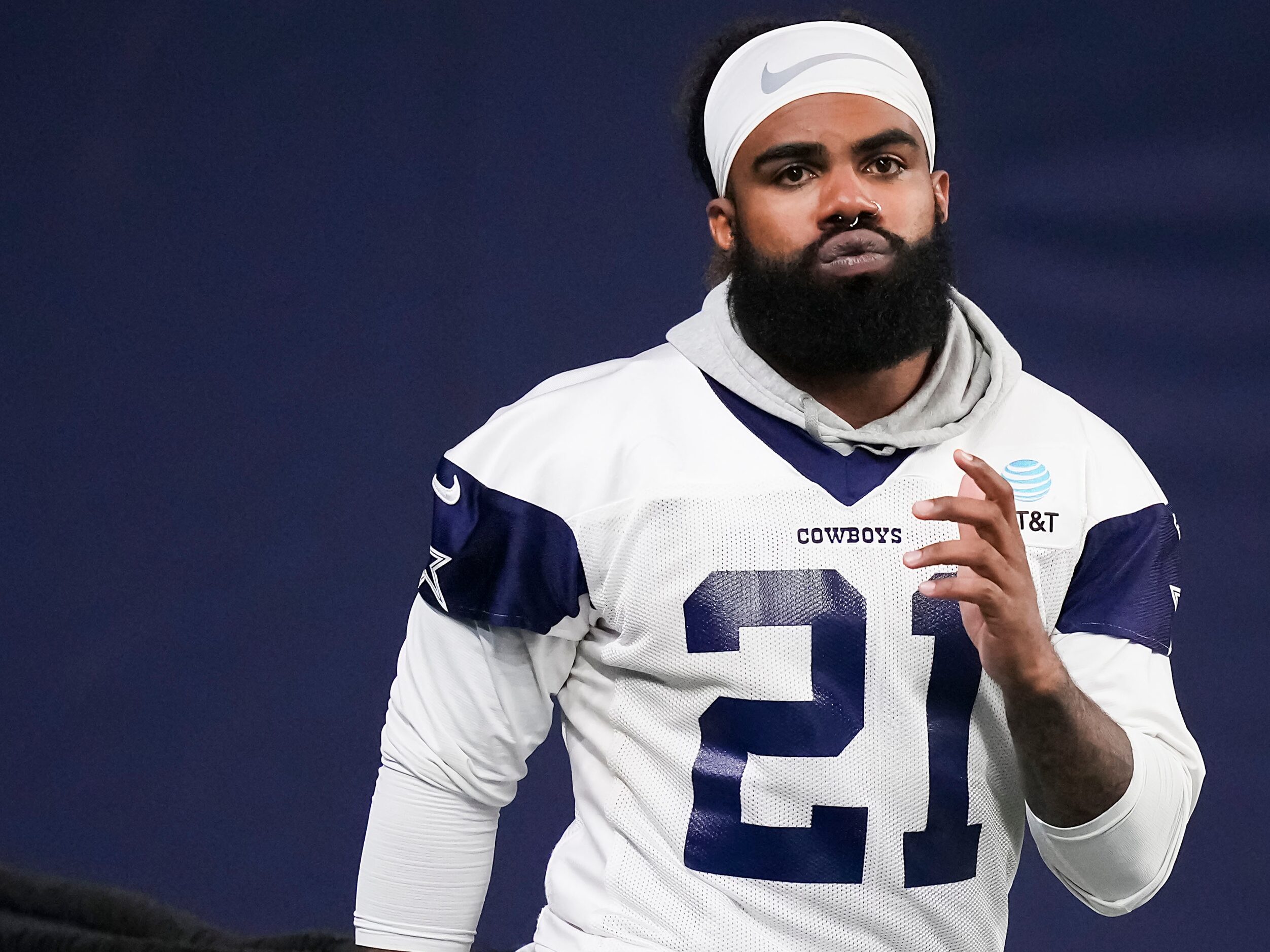 Dallas Cowboys running back Ezekiel Elliott works with a resistance band during the team's...