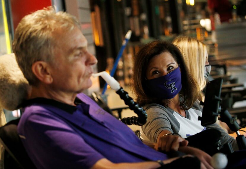 Jim Hilliard with his wife Tamara Hillard and Kat Minnerly watch as their son Colorado...