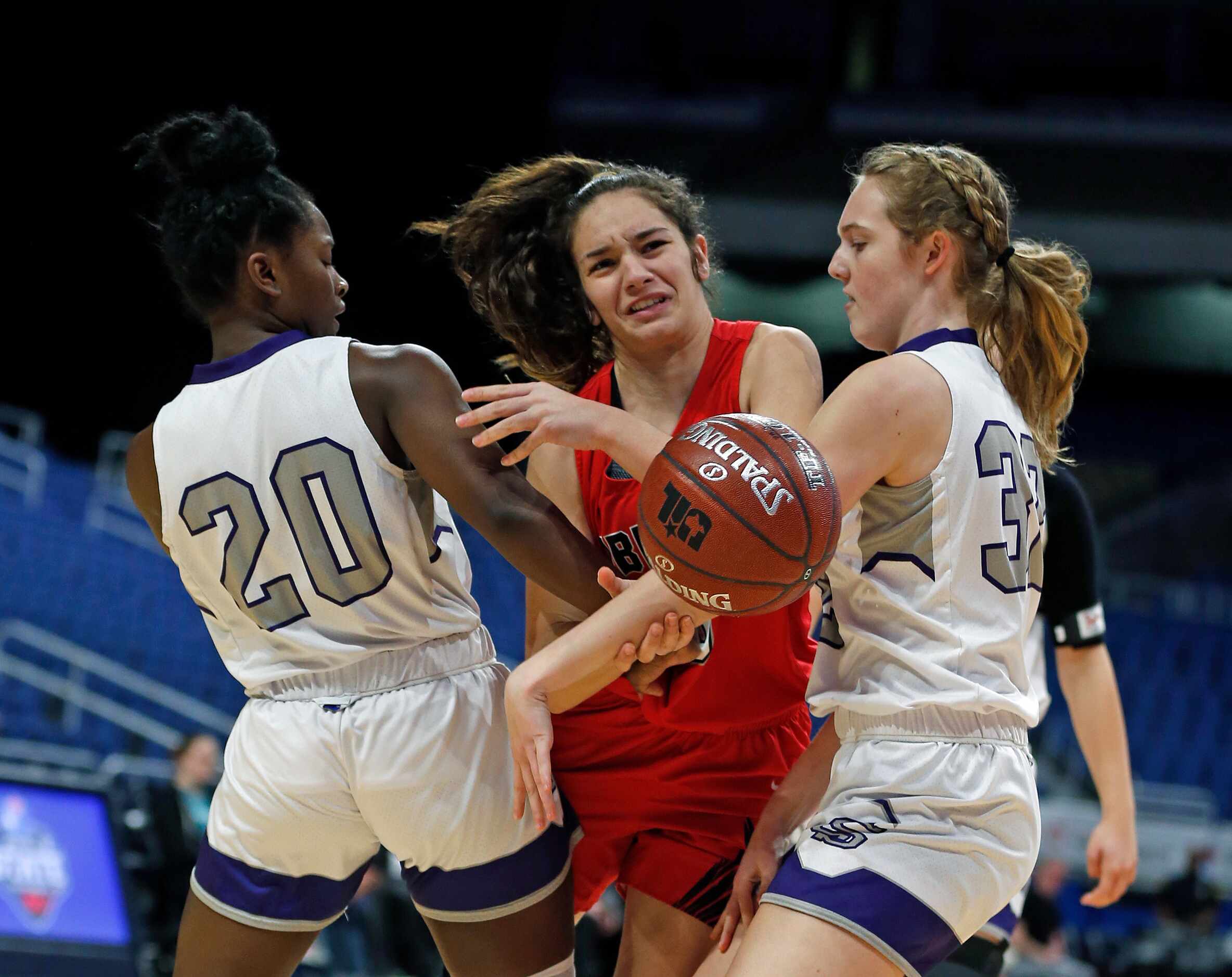 Frisco Liberty guard Jezelle Jolie Moreno #0 os trapped by College Station guard Cornecia...