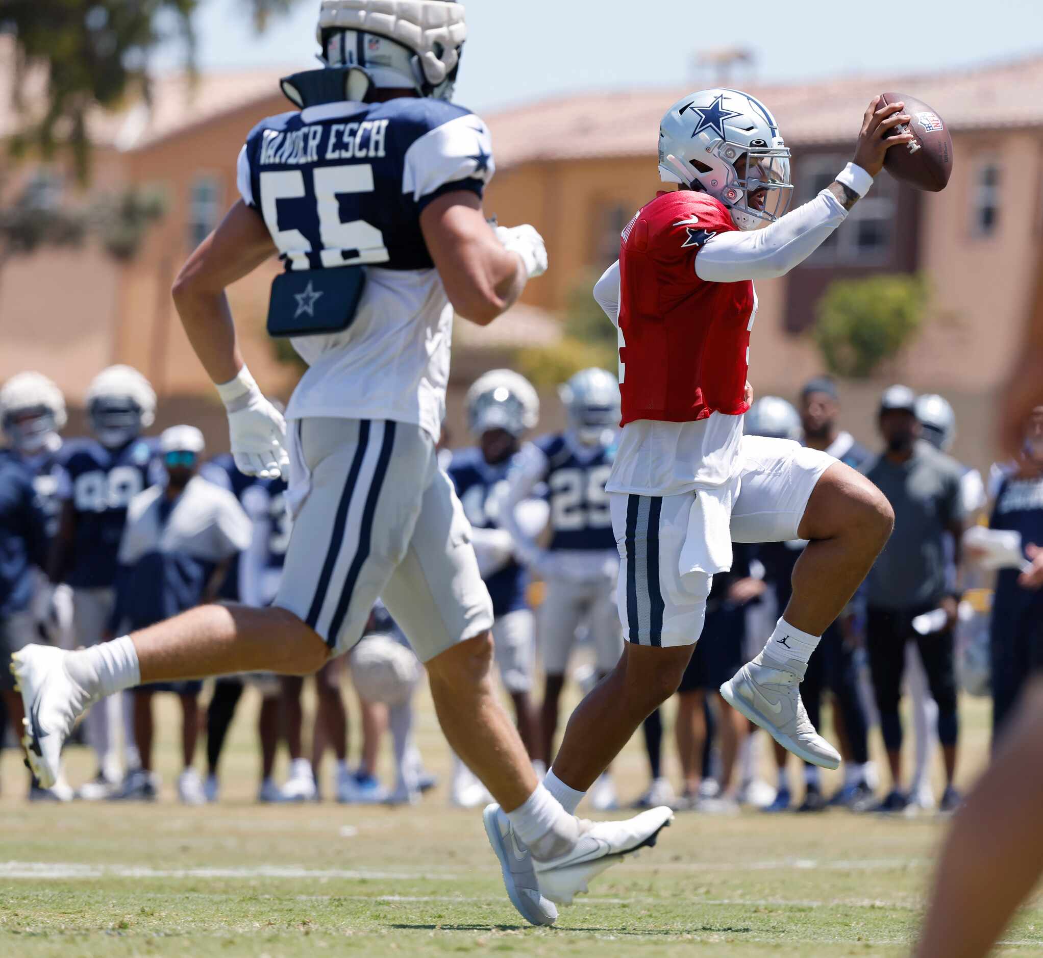 Dallas Cowboys quarterback Dak Prescott (4) keeps the ball and runs in for a touchdown...