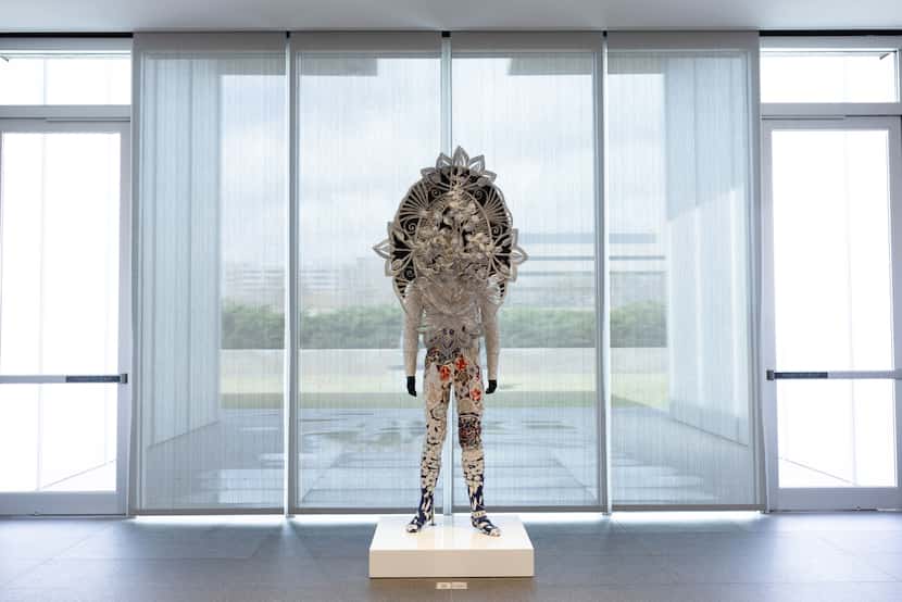 One of Nick Cave’s elaborately ornamented "Soundsuits," created in response to the 1991 Los...