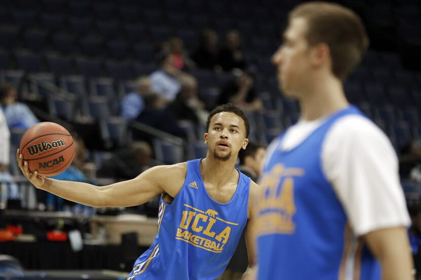 UCLA's Kyle Anderson works out during practice at the NCAA college basketball tournament,...