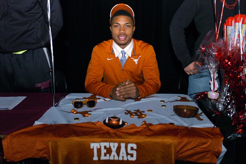 Denton Guyer senior quarterback Jerrod Heard signs with the University of Texas as part of...